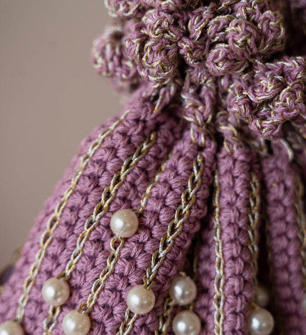 Mauve pearl flat potli bag
