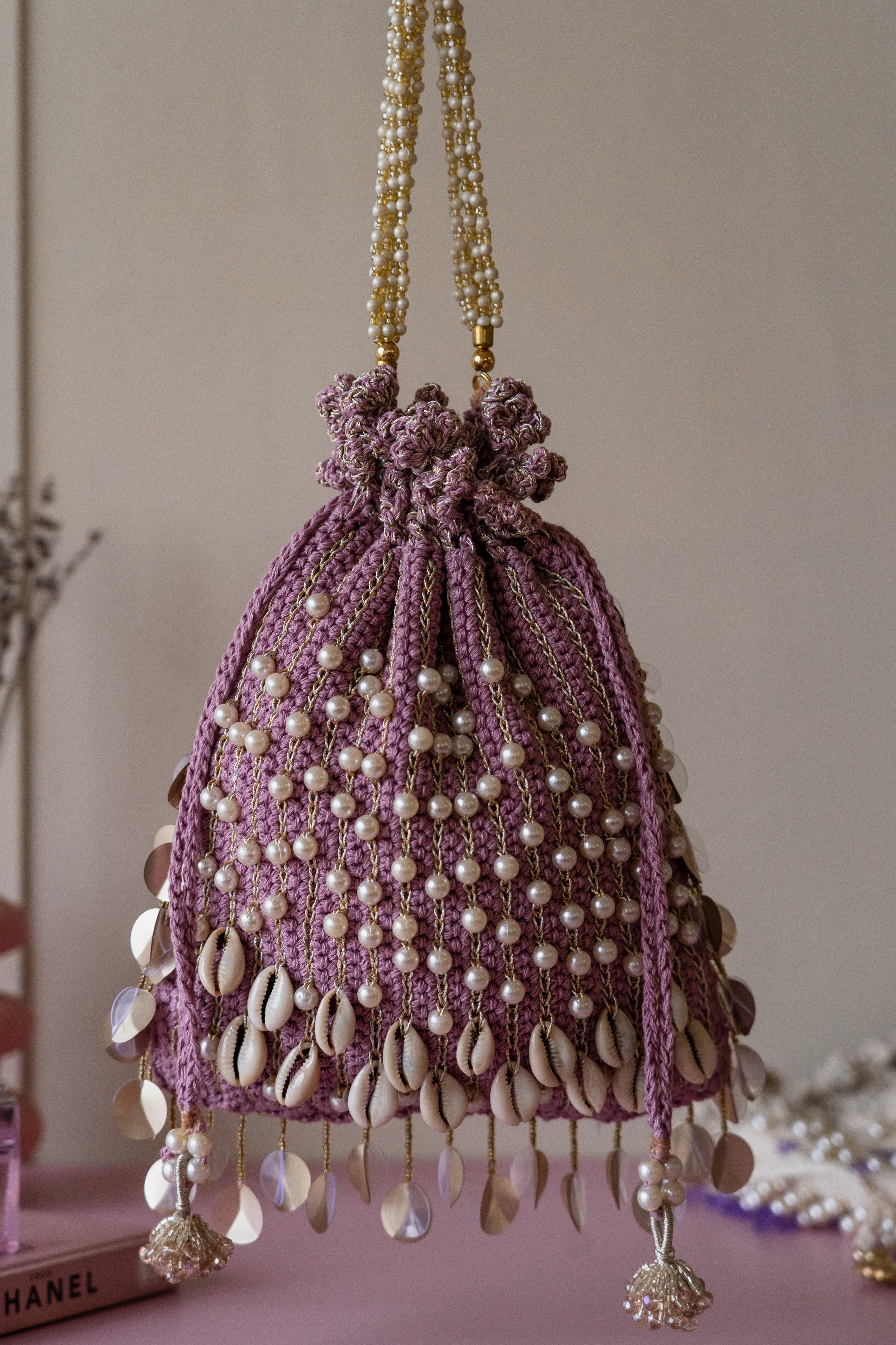 Mauve pearl flat potli bag