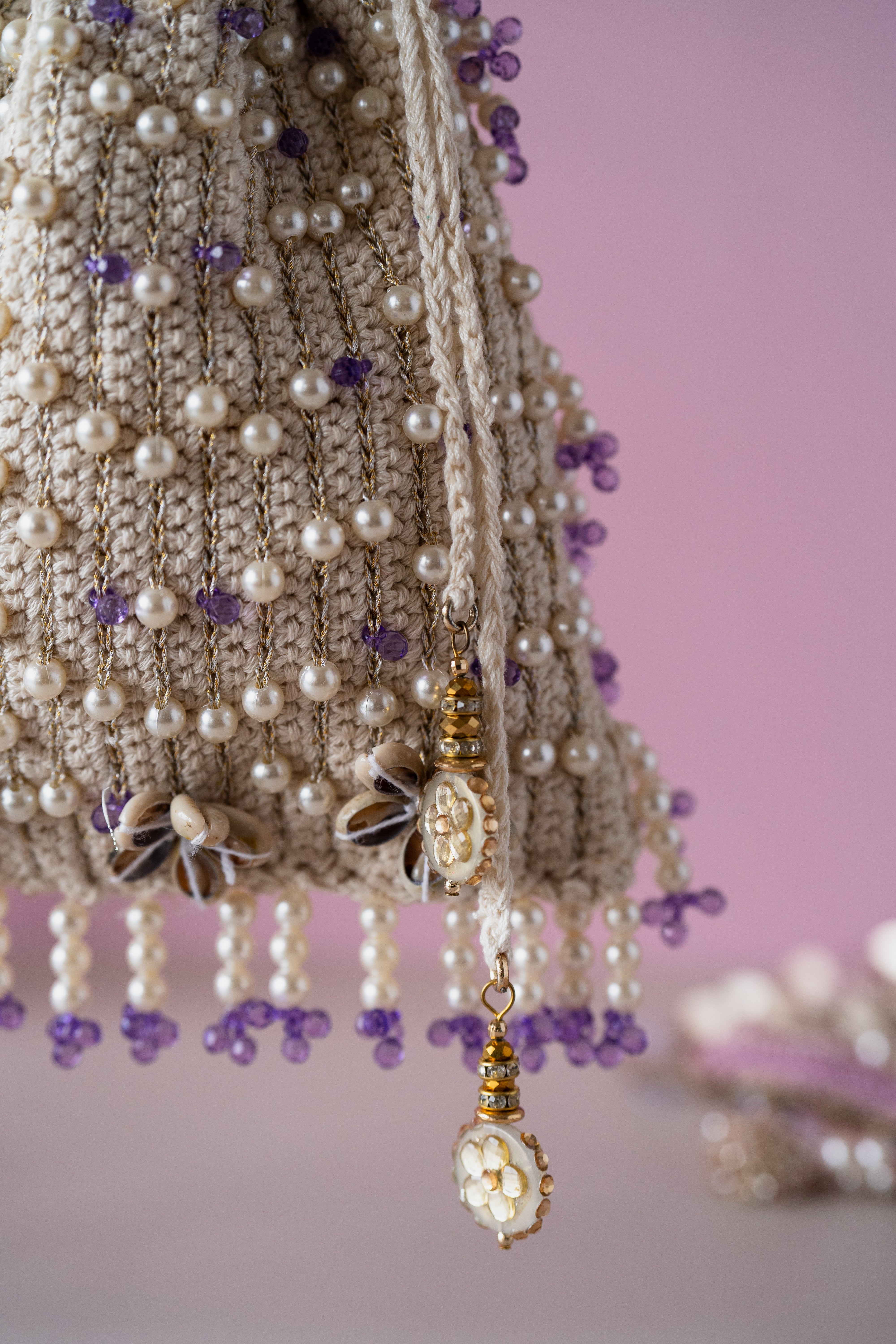 Ivory purple flat potli bag