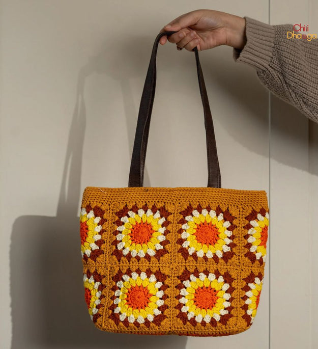 Mustard yellow patchwork crochet handbag