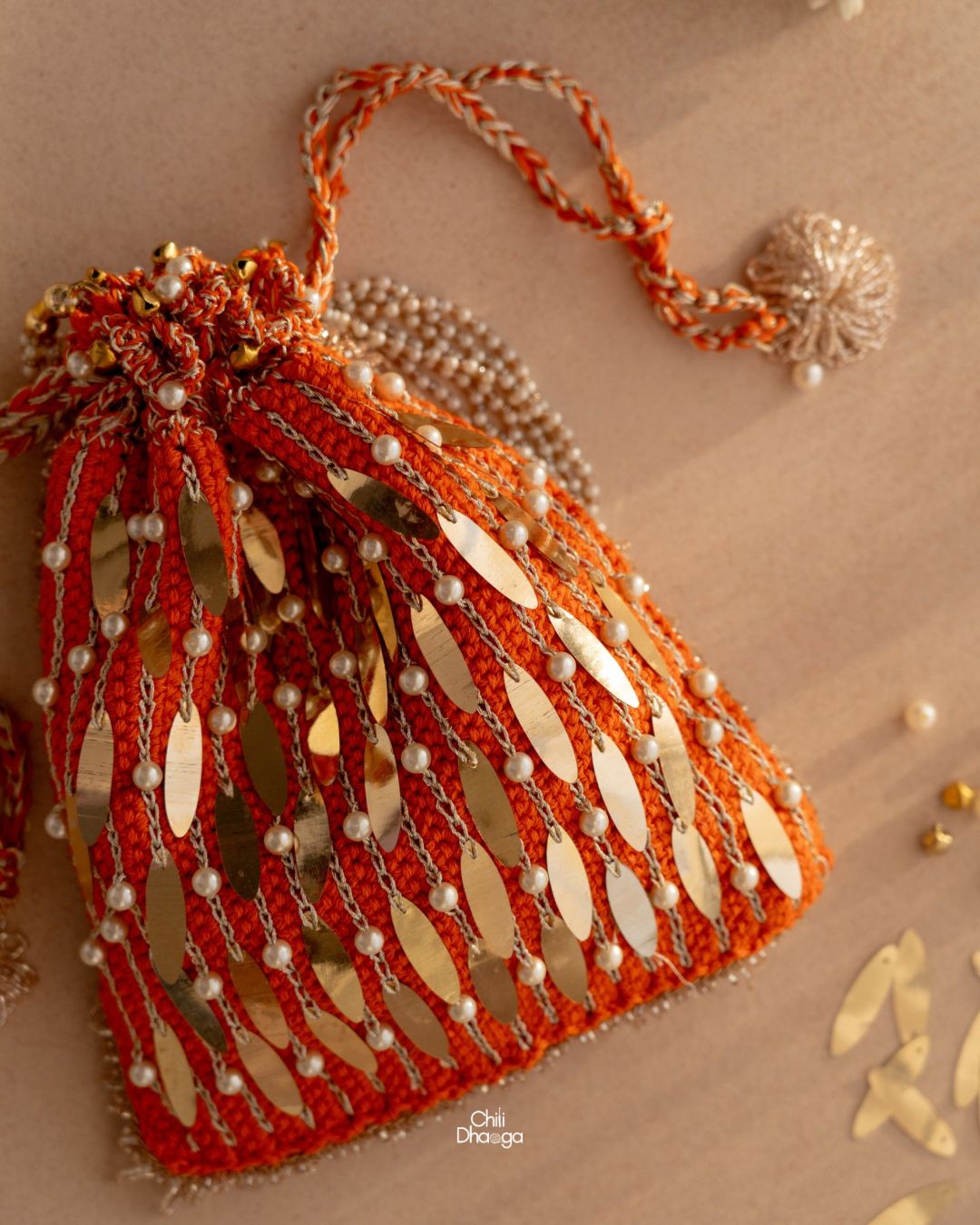 Orange crochet potli bag