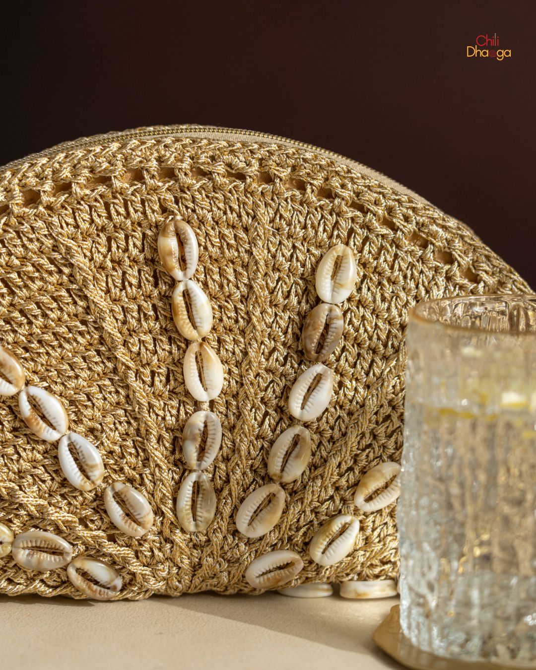 Golden metallic cowry/sea shell semi circle purse