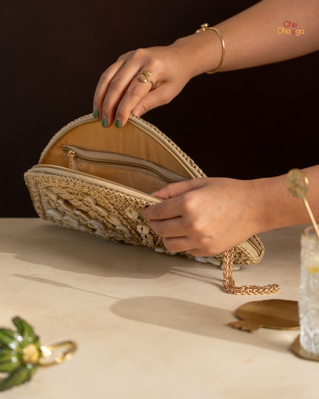 Golden metallic cowry/sea shell semi circle purse