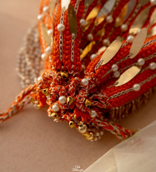 Orange crochet potli bag
