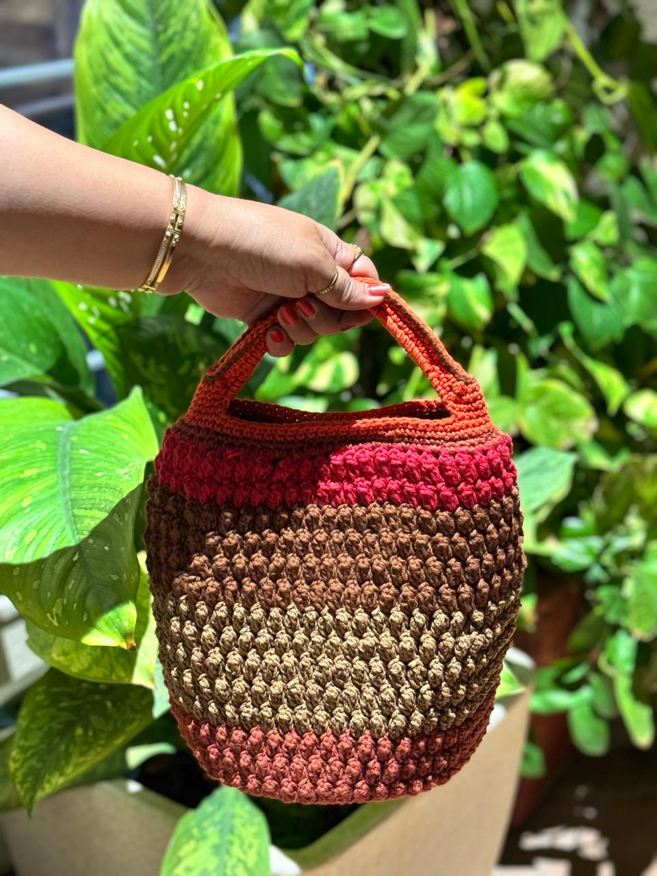 Red ember crochet bucket handbag