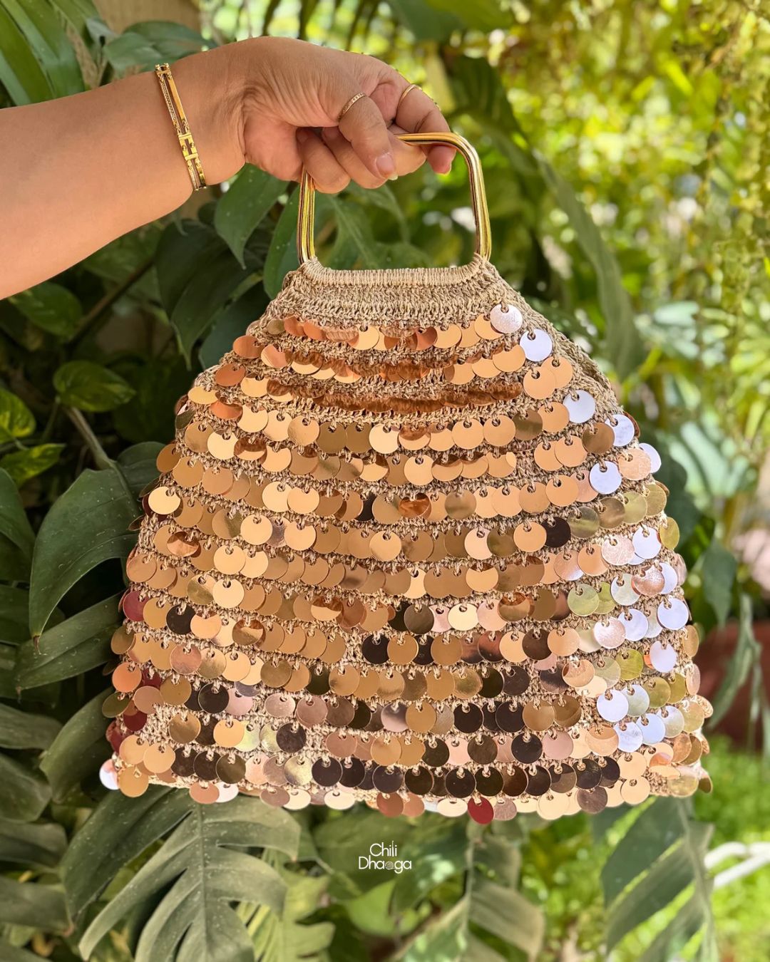 Rose gold sequin crochet handbag