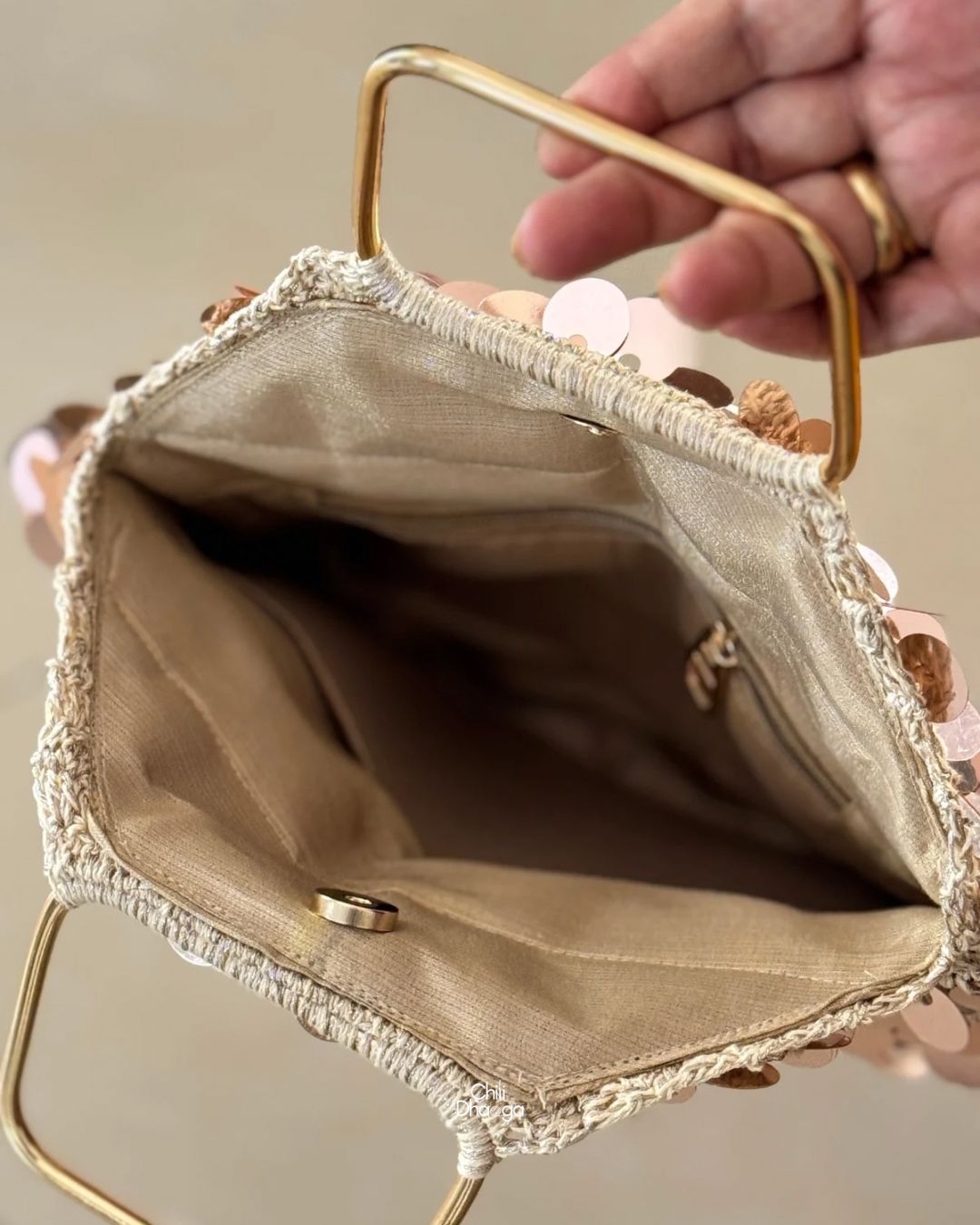 Rose gold sequin crochet handbag