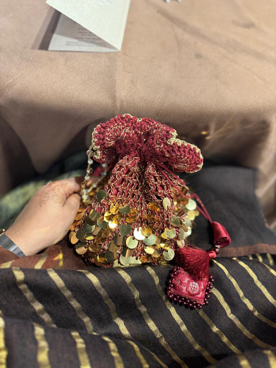 Maroon sequins crochet potli bag