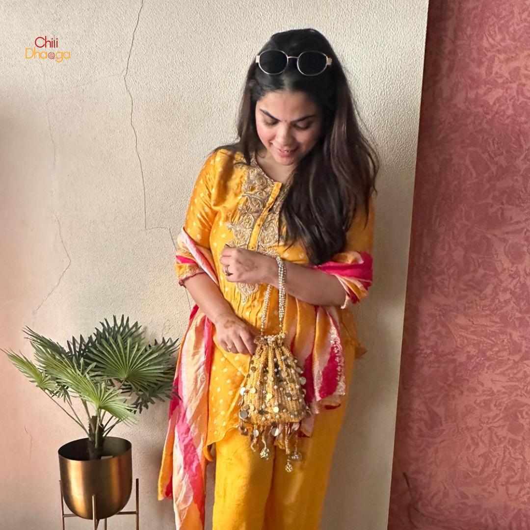 Yellow pearl flat crochet potli bag